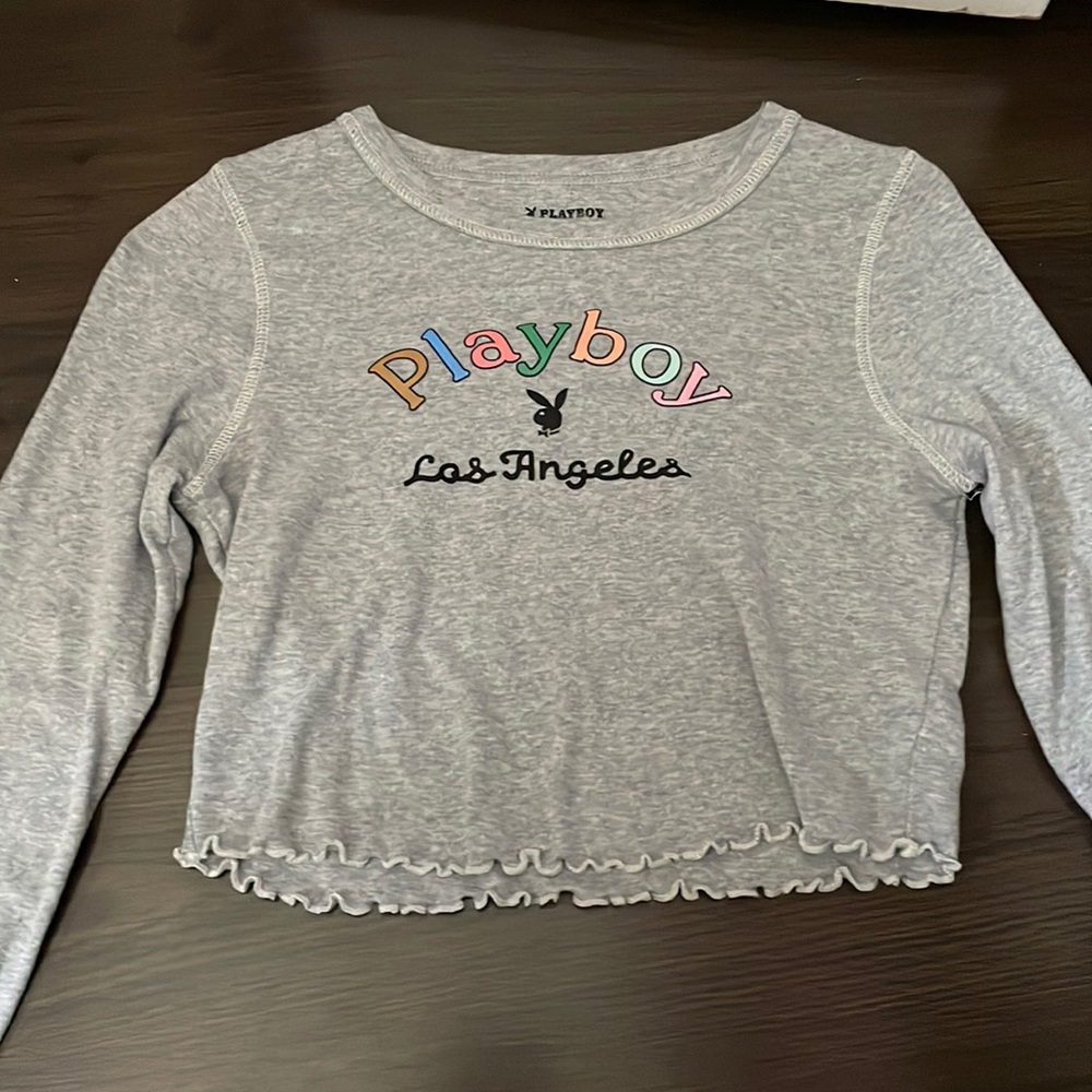 The brand is playboy sold at pacsun gray color bright colors for the summer